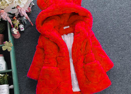 A girl's fur coat for autumn and winter