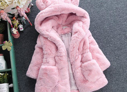 A girl's fur coat for autumn and winter