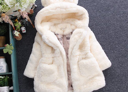 A girl's fur coat for autumn and winter